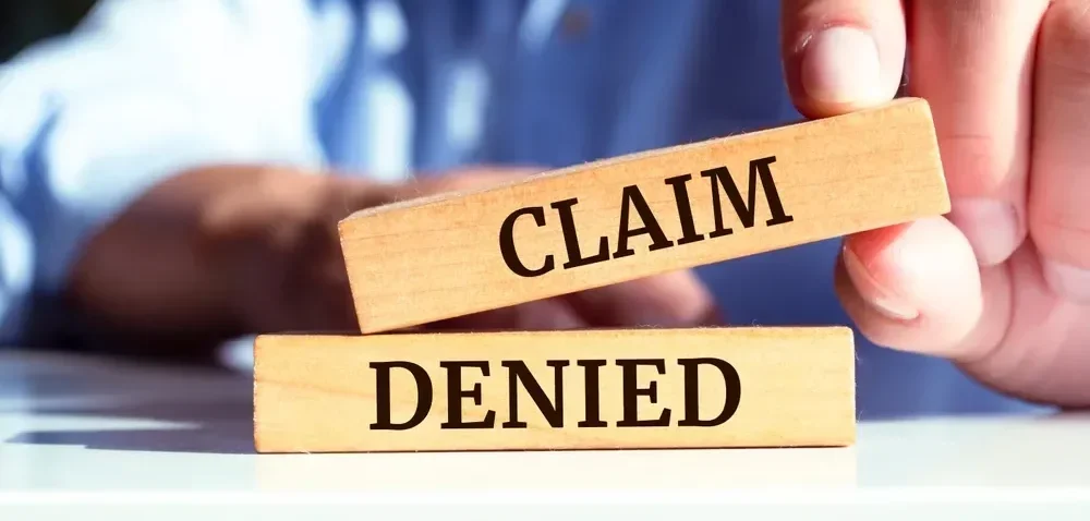 medical claims specialist reviewing insurance claims